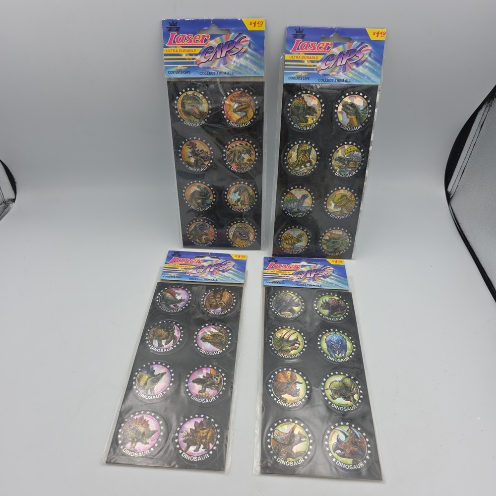 Jurassic Pogs On‎ Sheet Lot Of 32 Dinosaurs Laser Caps USA VTG NEW